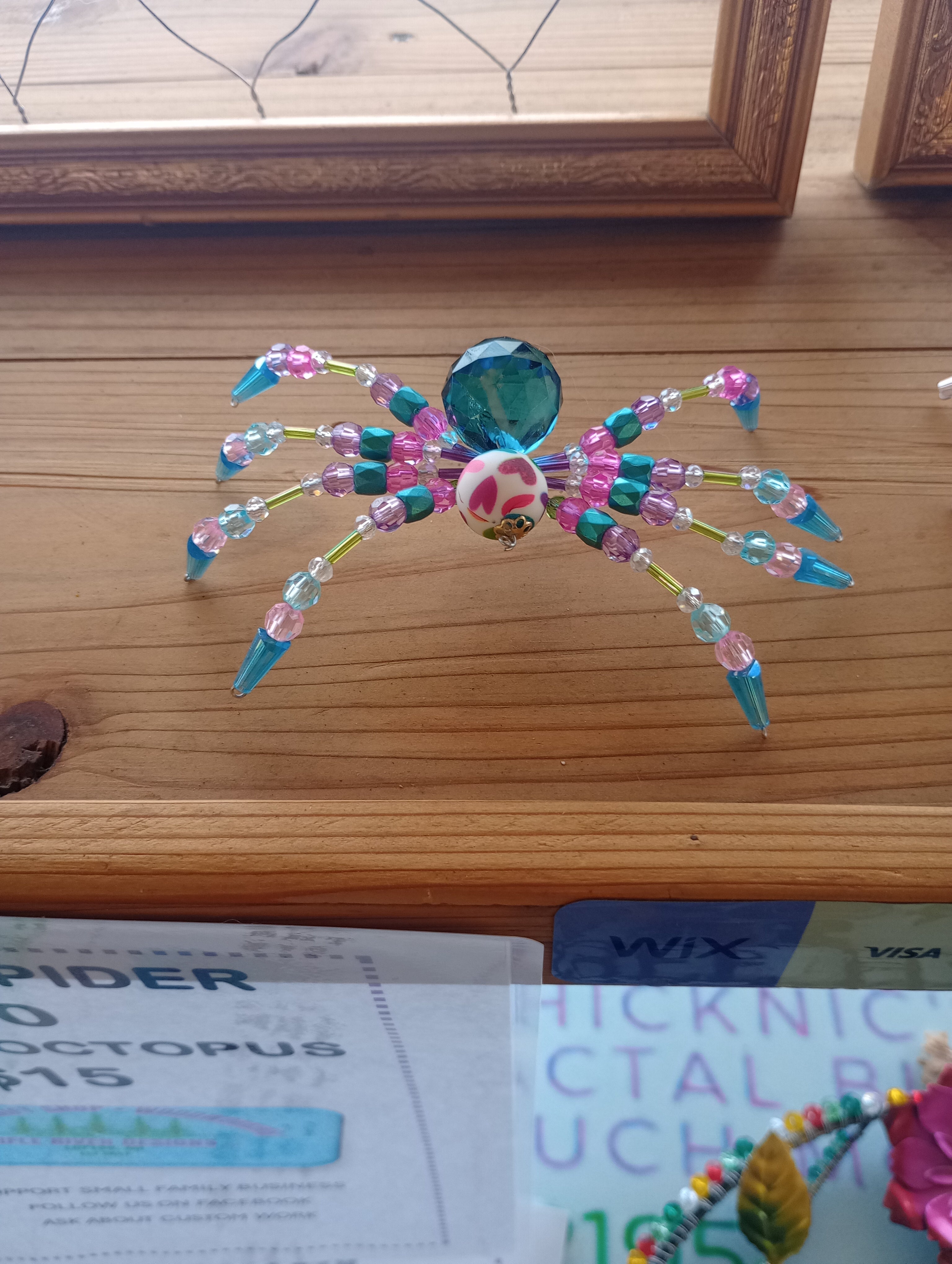 Beaded tabletop spider -cotton candy colored image 0